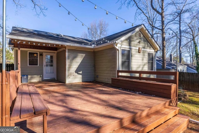 rear view of property with a deck