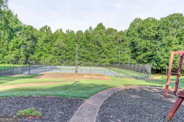 view of yard featuring tennis court