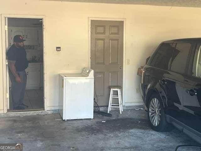 garage featuring washer / clothes dryer