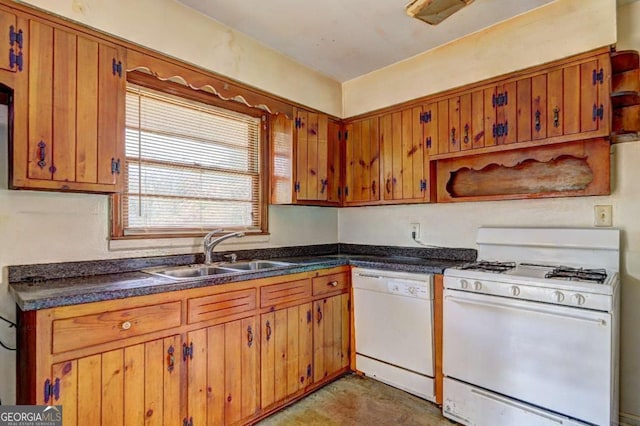 kitchen featuring white appliances and sink