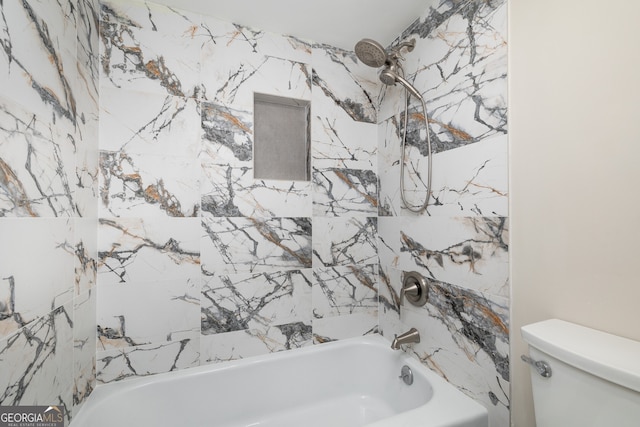 bathroom with shower / bathtub combination and toilet