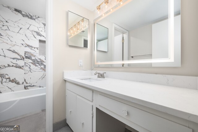 bathroom with vanity and shower / bathtub combination