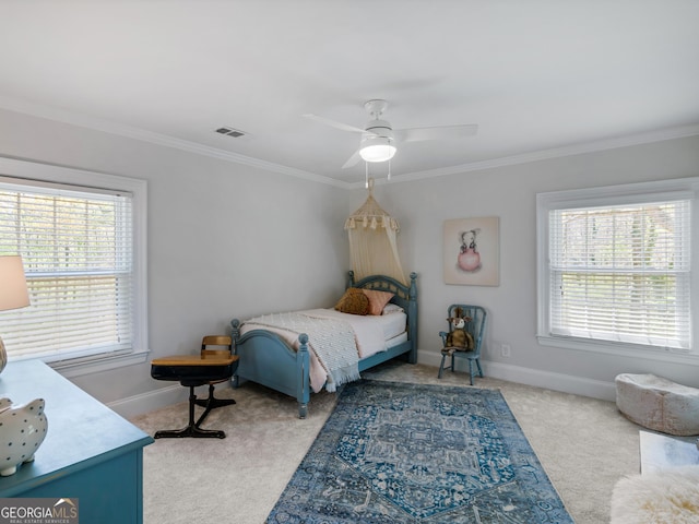 bedroom featuring ceiling fan, light carpet, and ornamental molding