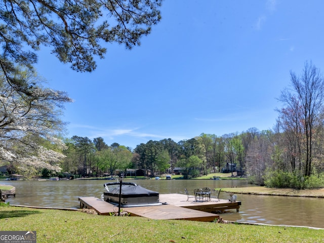 view of dock with a water view