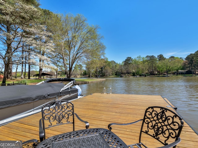 view of dock with a water view