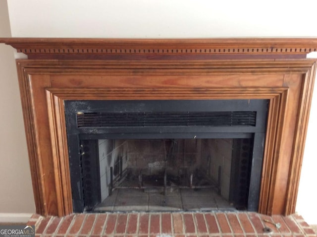 interior details with a fireplace