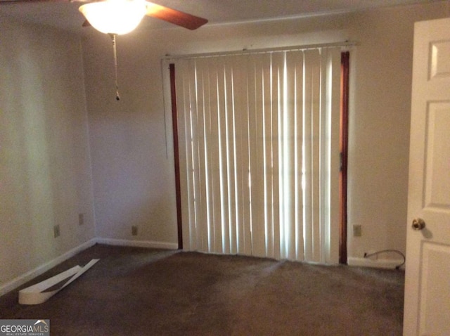 spare room with ceiling fan