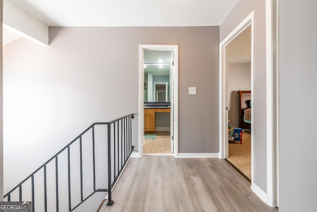 corridor featuring light wood-type flooring