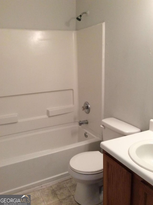 full bathroom with shower / washtub combination, vanity, and toilet