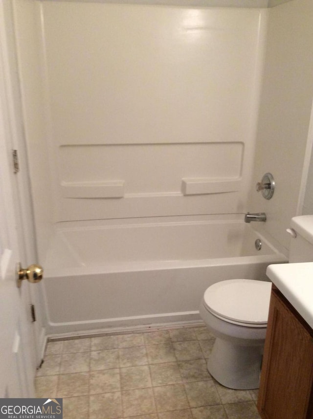 full bathroom with vanity, toilet, and shower / washtub combination