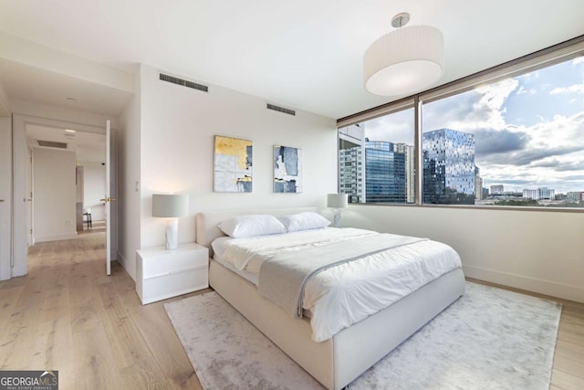 bedroom featuring light hardwood / wood-style flooring