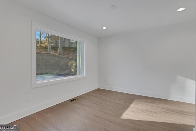 empty room featuring light hardwood / wood-style floors