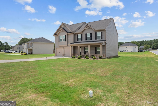 view of front facade with a front lawn, a porch, and a garage