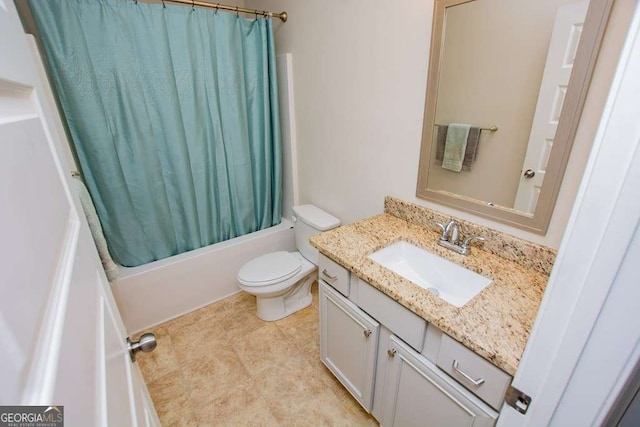 full bathroom with vanity, shower / bath combination with curtain, and toilet