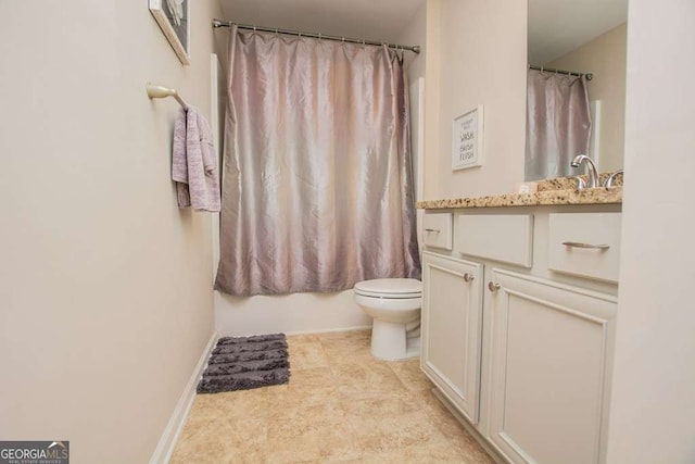 full bathroom with vanity, shower / bath combination with curtain, and toilet