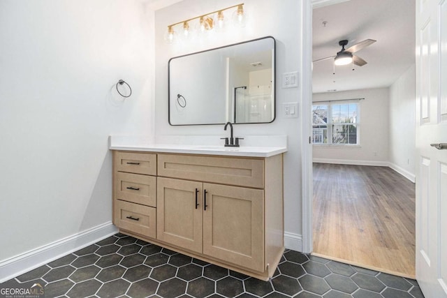 bathroom featuring vanity and ceiling fan