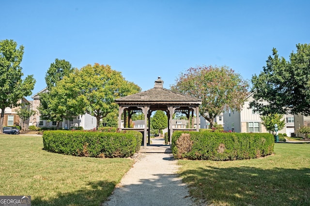 view of community with a gazebo and a yard