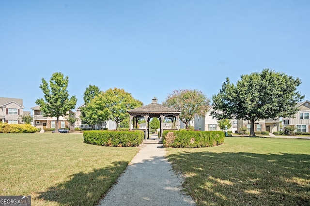 view of community featuring a gazebo and a yard