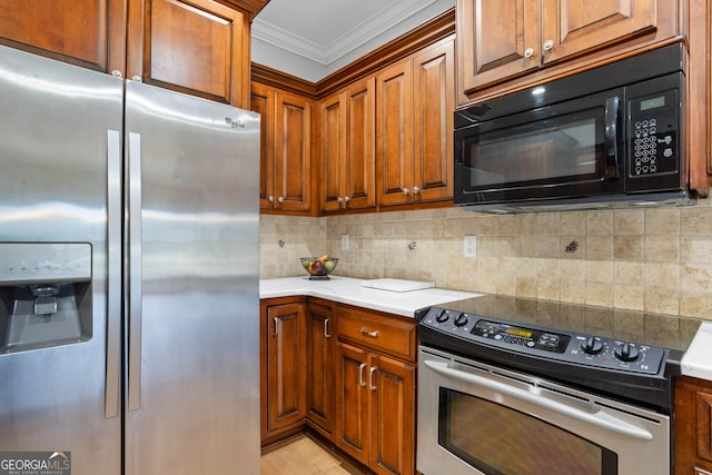 kitchen with backsplash, ornamental molding, and stainless steel appliances