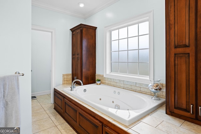 bathroom with tile patterned floors, crown molding, and a washtub