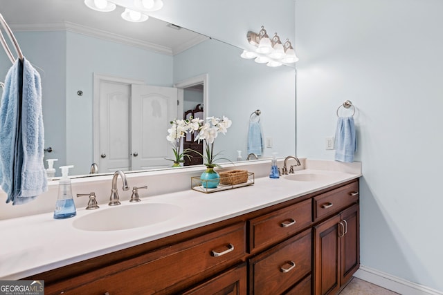 bathroom featuring vanity and crown molding