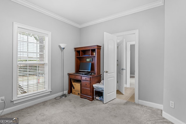 home office with crown molding and light carpet