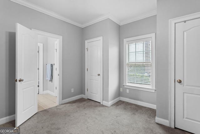 unfurnished bedroom with light carpet and ornamental molding