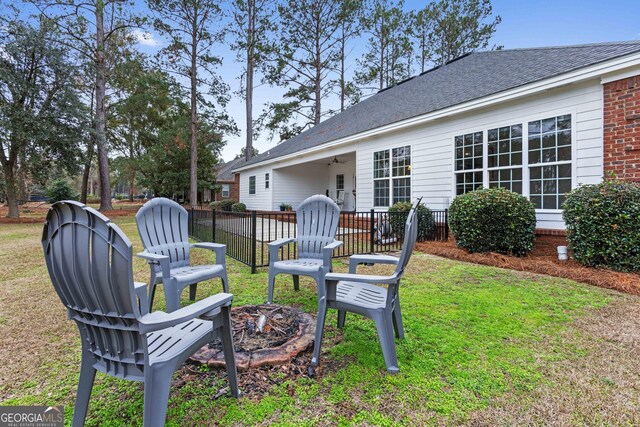 view of yard featuring a fire pit