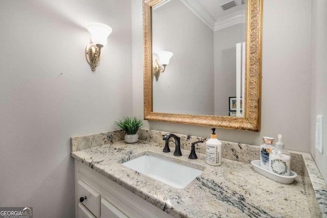 bathroom featuring vanity and ornamental molding