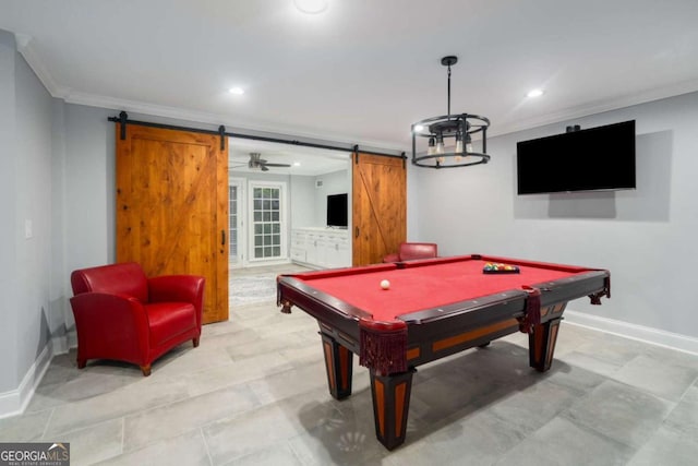 playroom featuring a barn door, ceiling fan, billiards, and ornamental molding