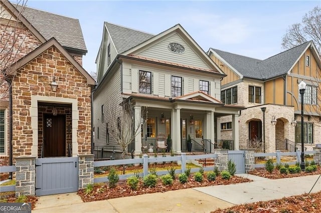 view of front of property featuring covered porch