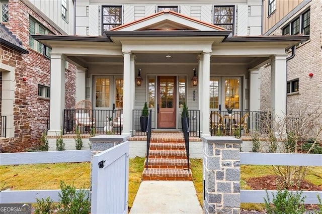 doorway to property with a porch