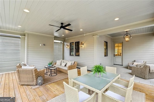 deck with ceiling fan and an outdoor hangout area