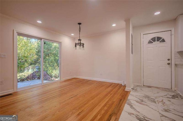 interior space with crown molding