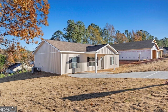 view of front facade featuring cooling unit