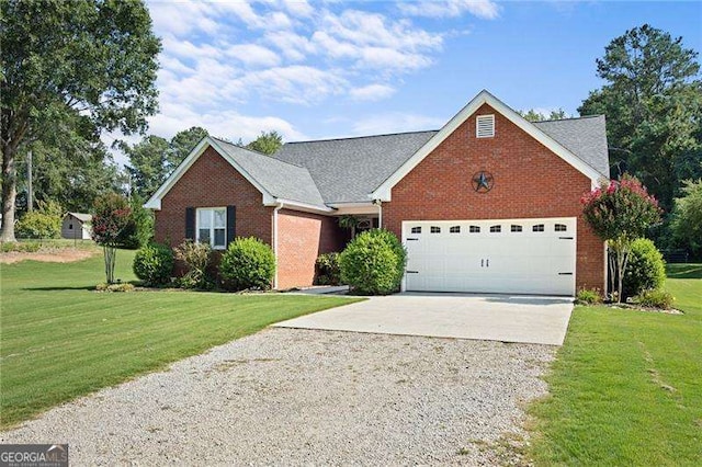 view of front of property featuring a front lawn and a garage