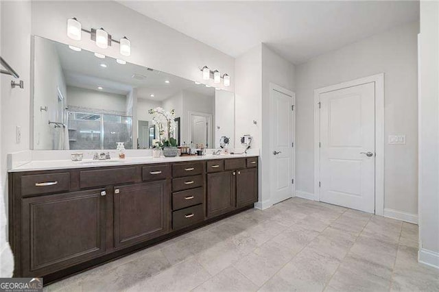 bathroom with vanity and walk in shower