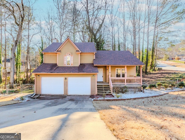 view of front of house featuring a porch and a garage