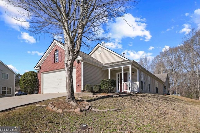 front of property with a garage and covered porch