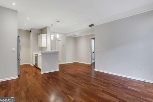 unfurnished living room featuring dark hardwood / wood-style flooring