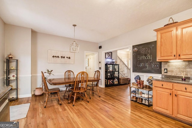 dining room with light hardwood / wood-style floors