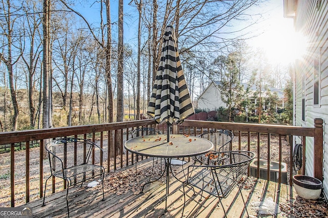 wooden deck featuring central AC