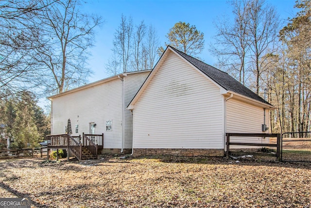 view of home's exterior with a deck