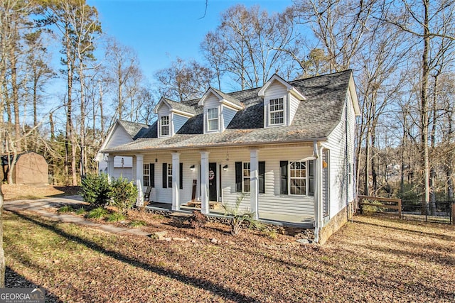 cape cod home with covered porch