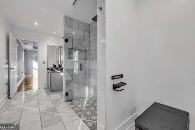 bathroom featuring vanity and walk in shower