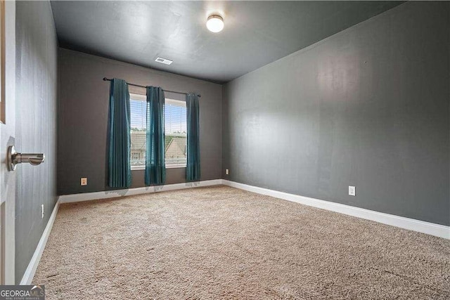 view of carpeted spare room