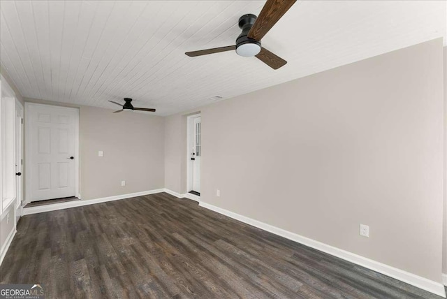 empty room featuring dark hardwood / wood-style floors