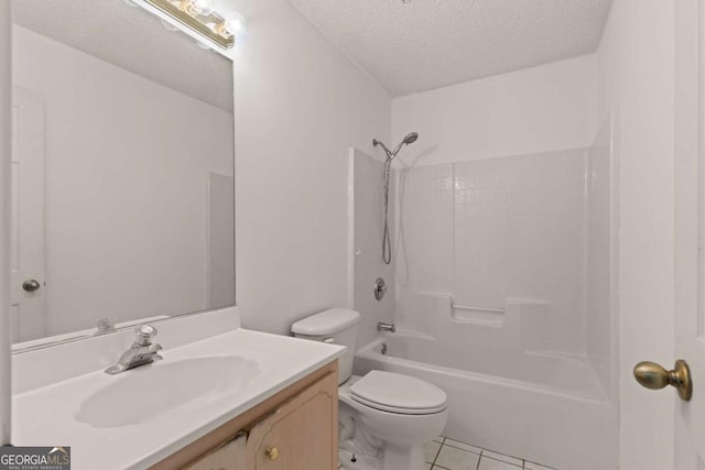 full bathroom with tile patterned floors, bathing tub / shower combination, a textured ceiling, toilet, and vanity