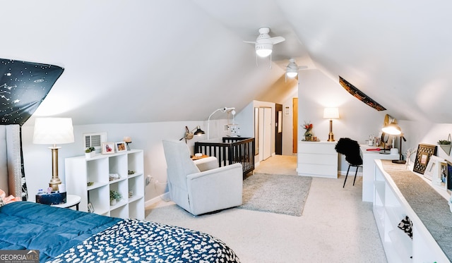 bedroom featuring vaulted ceiling and light colored carpet