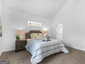 bedroom with carpet flooring and high vaulted ceiling